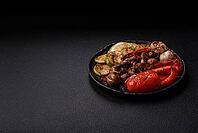 Grilled vegetables, bell peppers, mushrooms, and zucchini, a vegetarian healthy meal with sauce. Grilled vegetables on a plate as a food background for your design [IBR124865252]