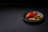 Grilled red bell peppers, vegetarian food. Red bell peppers as a food background for your design [IBR124865279]