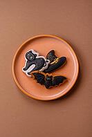Halloween cookies, sweets, or gingerbread, a cat, a bat, and a hat. Halloween cookies as a backdrop for your design [IBR124865285]