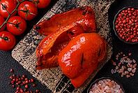 Grilled red bell peppers, vegetarian food. Red bell peppers as a food background for your design [IBR124865287]