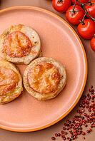 Round fish or chicken cutlets baked with tomato and cheese. Fish cutlets as a food backdrop for your design [IBR124865292]