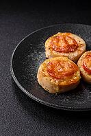 Round fish or chicken cutlets baked with tomato and cheese. Fish cutlets as a food backdrop for your design [IBR124865302]