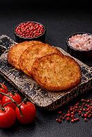 Potato hash browns, a cooked vegetable breakfast food. Potato hash browns as a food background for your design [IBR124865312]