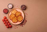 Potato hash browns, a cooked vegetable breakfast food. Potato hash browns as a food background for your design [IBR124865320]
