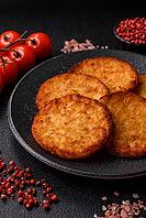 Potato hash browns, a cooked vegetable breakfast food. Potato hash browns as a food background for your design [IBR124865321]