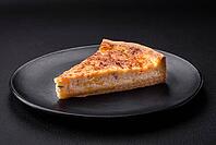 Food, Beautiful delicious quiche pie with four types of cheese with spices and herbs on a dark concrete background [IBR124876433]