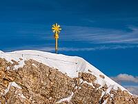 Summit cross on the Zugspitze, the highest mountain in Germany [IBR124898939]