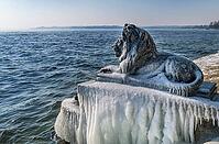 Bavarian lion covered in ice on an icy winter day in Tutzing am Starnberger See, Upper Bavaria, Bavaria, Germany [IBR124898951]