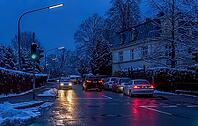 Road traffic in Tutzing in winter at night, Bavaria, Germany, Europe Road traffic in a village in winter at night, Tutzing, Bavaria, Europe traffic, street, village, wet, roadway, cars, black ice, glazed frost, slippery, ice, rain, lightning, danger of ac [IBR124898988]