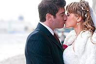 Just married couple is kissing at street [IBR124906371]