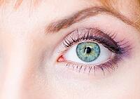 Closeup view of a beautiful female eye with make-up [IBR124906373]