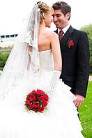 Bride is hiding her wedding bouquet from groom [IBR124906376]