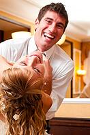 Funny wedding dance of bride and groom [IBR124906377]