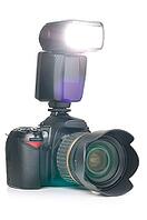 Photo camera with an external flash installed [IBR124906403]