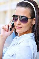 Strict woman is looking back and talking phone [IBR124906404]