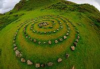 View of a fairytale hilly landscape surrounded by myths and legends about fairies taken on the Isle of Skye in summer 2018 [IBR124915231]