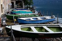 View of boats at the pier against mountains [IBR124915252]