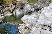 View of a creek surrounded by rocks [IBR124915254]