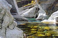 View of a creek surrounded by rocks [IBR124915284]