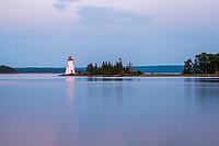 Lighthouse on an island in a lake [IBR124915315]