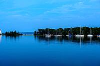 Lighthouse on an island in a lake [IBR124915316]