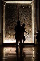 Beautiful door with geometric pattern of ancient Turkish style and people silhouette [IBR124920173]