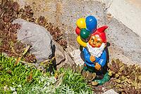 Colorful garden gnome in a garden, Gmund am Tegernsee, Gmund, Upper Bavaria, Bavaria, Germany [IBR124920233]