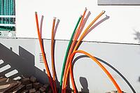 Construction site for laying fiber optic cables in front of a residential building, Bremen, Germany [IBR124920237]