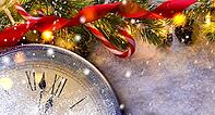Countdown to midnight. Retro style clock counting last moments before Christmas or New Year 2017 next to decorated fir tree. View from above [IBR124944042]