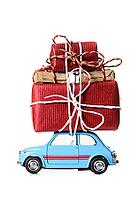 Blue retro toy car delivering Christmas or New Year gifts, isolated on white [IBR124944046]
