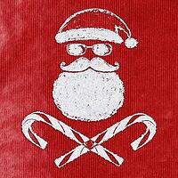 Bad Santa Claus symbol handwritten on christmas or new year card made of snow background with red craft paper below [IBR124944071]