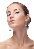 Close-up portrait of beautiful blue eyed caucasian model on white [IBR124968390]