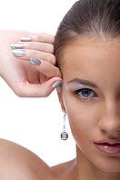 Close-up portrait of beautiful blue eyed caucasian model on white [IBR124968395]