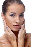 Close-up portrait of beautiful blue eyed caucasian model on white [IBR124968400]