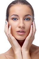 Close-up portrait of beautiful blue eyed caucasian model on white [IBR124968404]