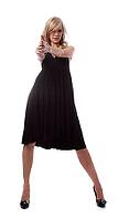 Portrait of beautiful blonde model poses in black dress [IBR124968406]