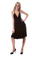 Portrait of beautiful blonde model poses in black dress [IBR124968408]