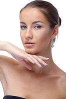 Close-up portrait of beautiful blue eyed caucasian model on white [IBR124968410]