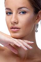 Close-up portrait of beautiful blue eyed caucasian model on white [IBR124968412]