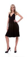 Portrait of beautiful blonde model poses in black dress [IBR124968415]