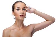 Close-up portrait of beautiful blue eyed caucasian model on white [IBR124968420]