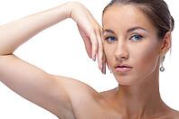 Close-up portrait of beautiful blue eyed caucasian model on white [IBR124968421]
