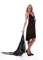 Portrait of beautiful blonde model poses in black dress with shawl [IBR124968427]