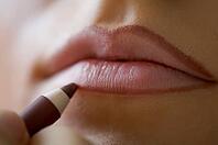 Close-up shot of work of make-up specialist. Low-focus image [IBR124968442]