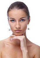 Close-up portrait of beautiful blue eyed caucasian model on white [IBR124968465]
