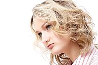 Portrait of blonde girl in pink dress on white background [IBR124968485]