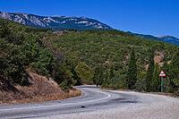 Crimean mountain road on a clear day in summer [IBR124991128]