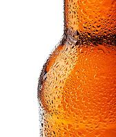 Bottle of beer with drops on white background [IBR124991141]