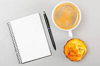 Creative process. blank notebook and cup on gray [IBR125000246]