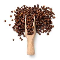 Bee pollen propolis in wooden scoop isolated on white background. Top view [IBR125000257]